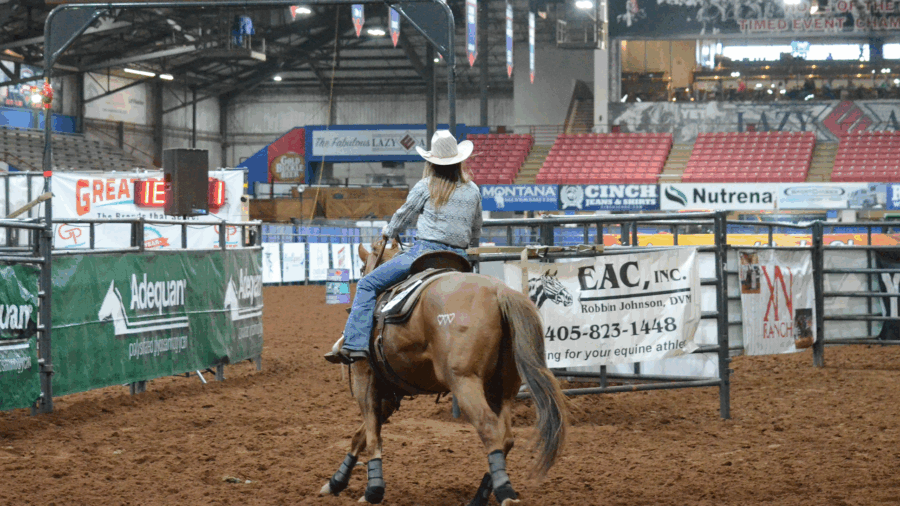 girl entering arena at BFA World Championship Futurity