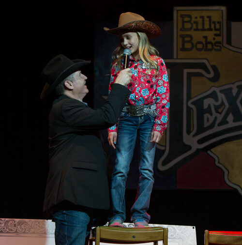A bidder put up $21,000 to buy space on 9-year-old barrel racer Chayni Chamberlain.