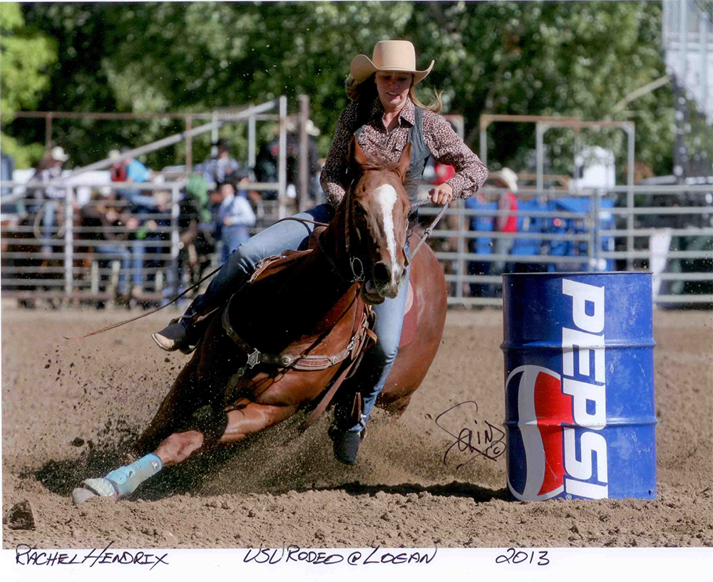 Rachel Hendrix and Blaze Ta Fame at the 2013 Utah State University College Rodeo in Logan, Utah.