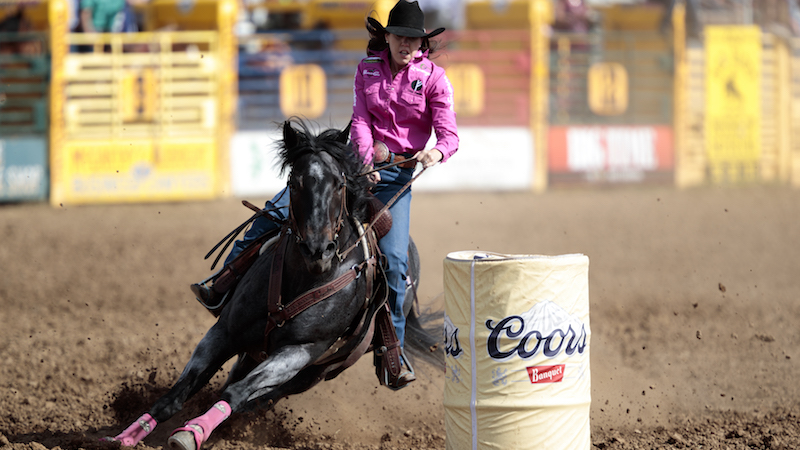 Nellie Miller riding Rafter W Minnie Reba at Red Bluff Round Up