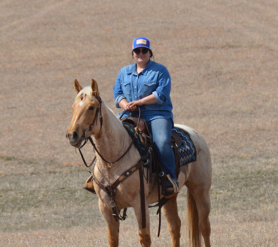 Managing Editor Kailey Sullins riding her filly Kitty