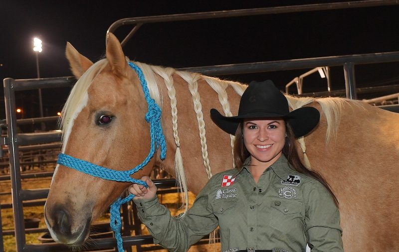 hailey kinsel and sister with rising star award at nfr 2017