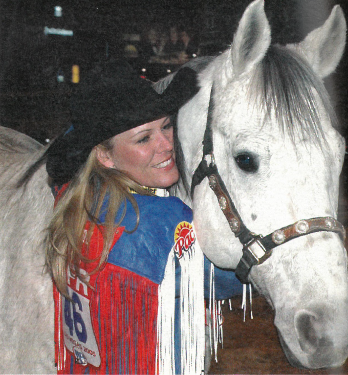 Kelly Kaminski hugging horse Rocky
