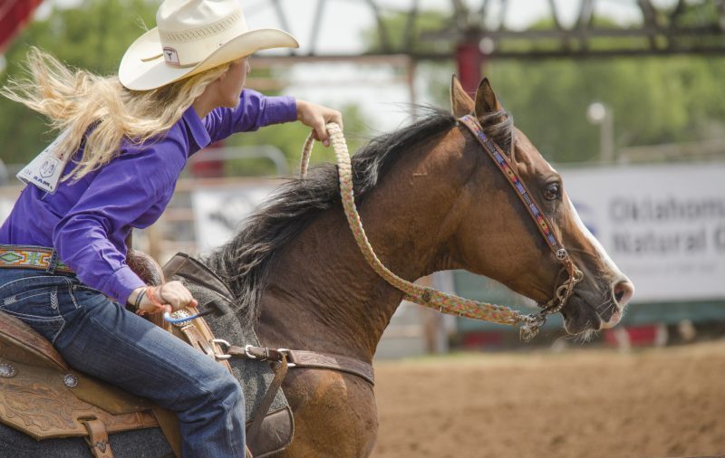 barrel racer entering arena