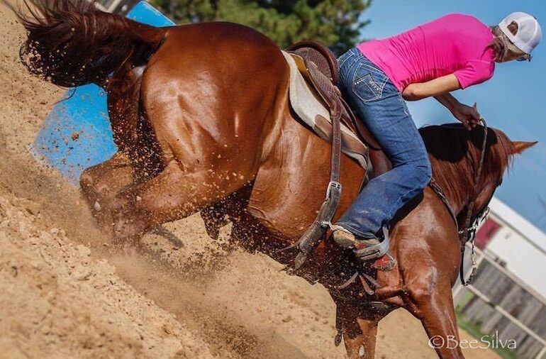 barrel horse running around barrel