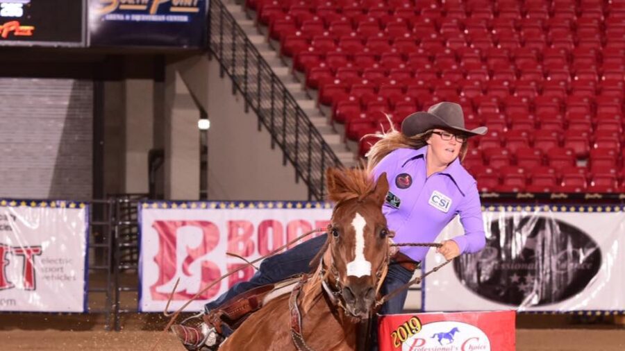 Cheyenne Lindsey and LL Cat Man Do turning a barrel