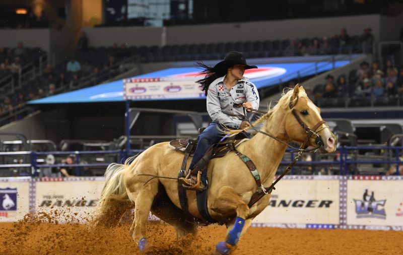 Hailey Kinsel and DM Sissy Hayday approach a barrel