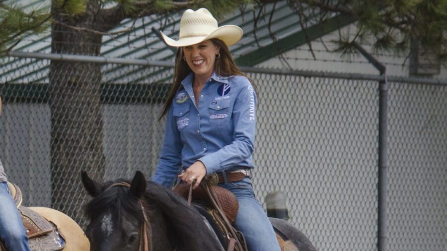 Nellie Miller and Rafter W Minnie Reba walking on the track at Cheyenne