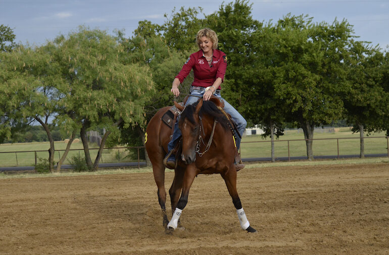 Kendra Dickson on bay horse demonstrating a balance and spatial awareness drill