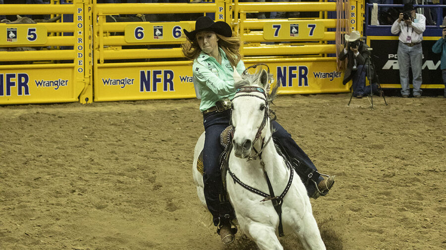 Emily Miller coming into the first barrel