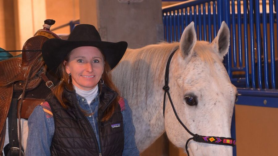 Jill Wilson standing with Lean Mean Blue Dean