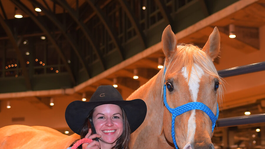 Hailey Lockwood standing with Sister at Fort Worth Stock Show Rodeo