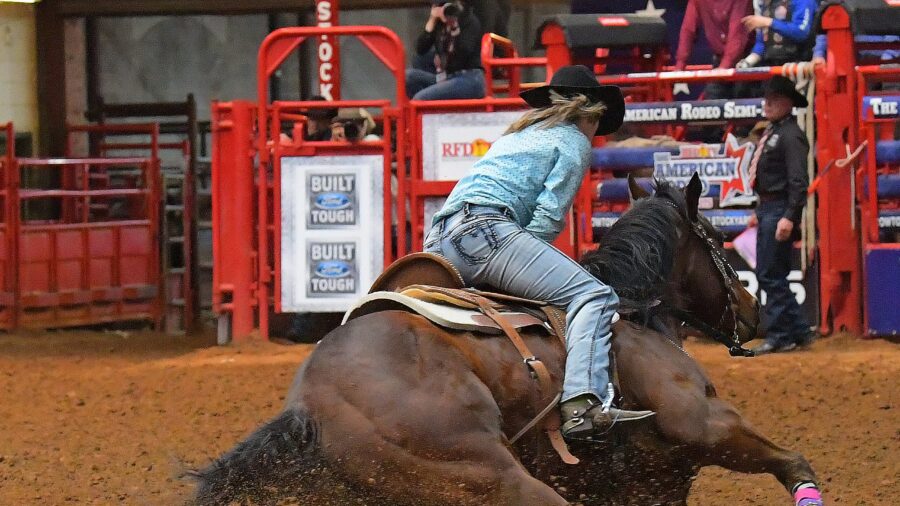 Randee Prindle and Red Man Jones turning the second barrel at RFD-TV's The American Semifinals