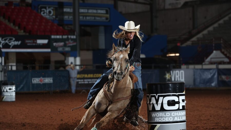 Michelle Darling turning the second barrel at the WCRA Stampede at the E
