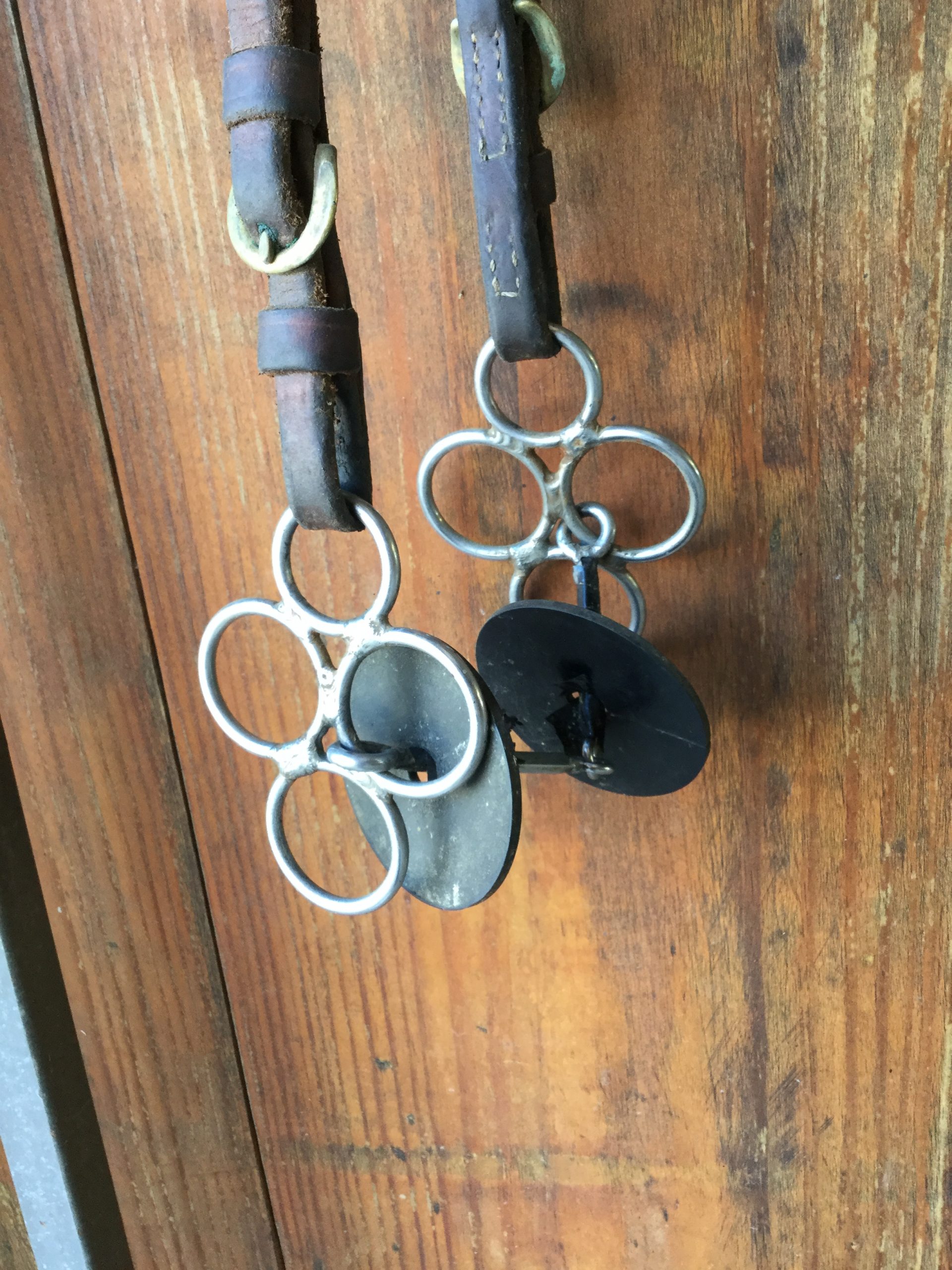 clover bit hanging against wall
