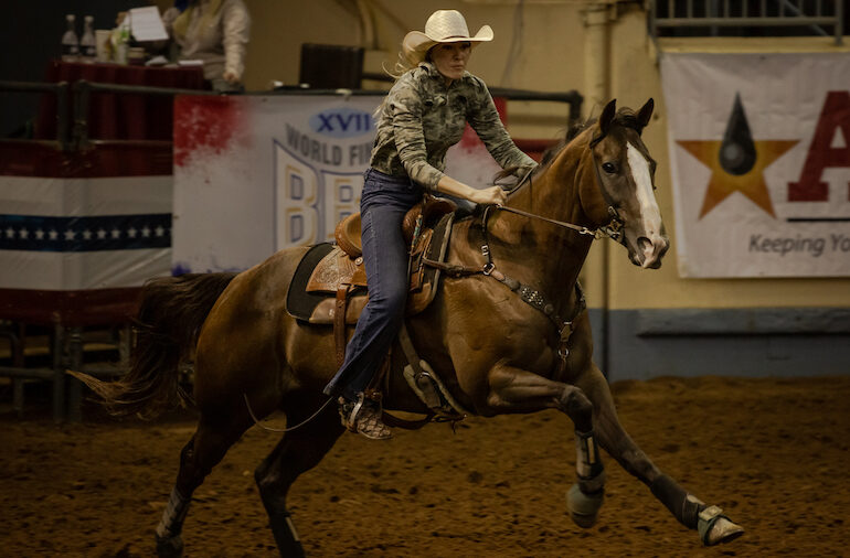Barrel racer warming up to try and prepare horse to be extra tenths faster