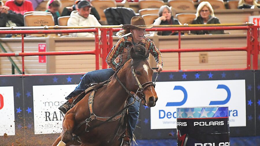 Tammy Ochs and Return Ofthe Chicado turning a barrel at Cowtown Coliseum