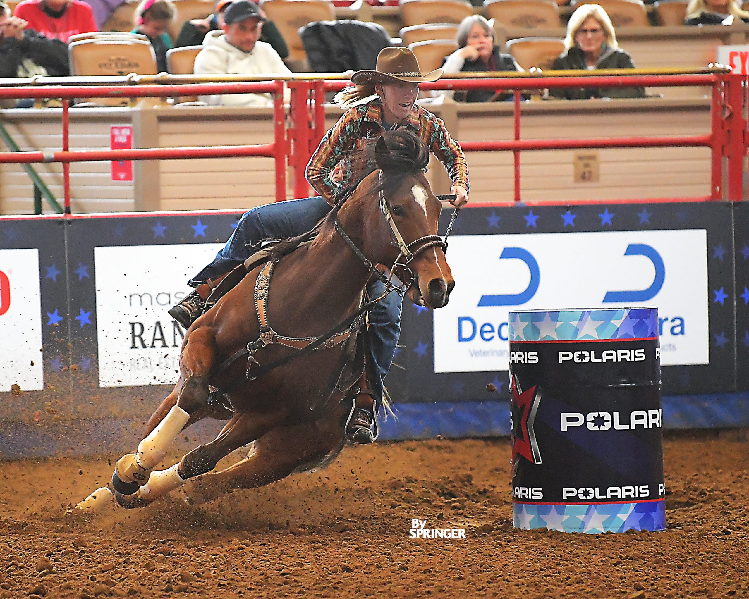 Tammy Ochs and Return Ofthe Chicado turning a barrel at Cowtown Coliseum