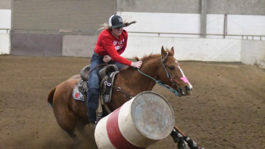 Regan Davis knocking a barrel over
