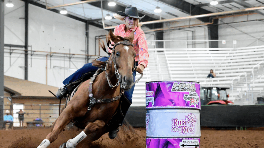 Vauna Walker turning a barrel on sorrel horse