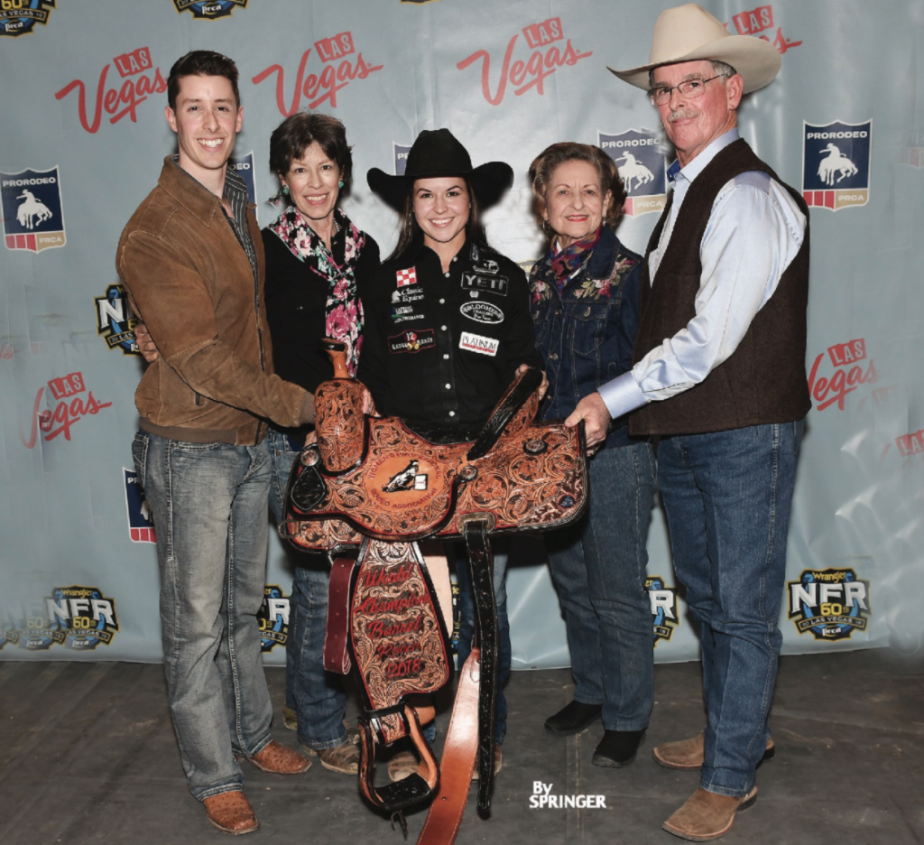 Kinsel family at 2018 NFR with world champion saddle