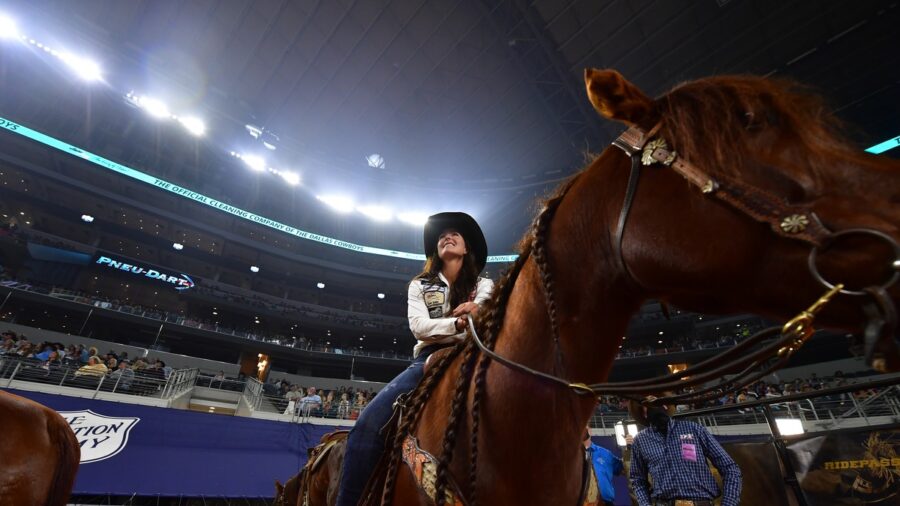 barrel racer looking up at stadium