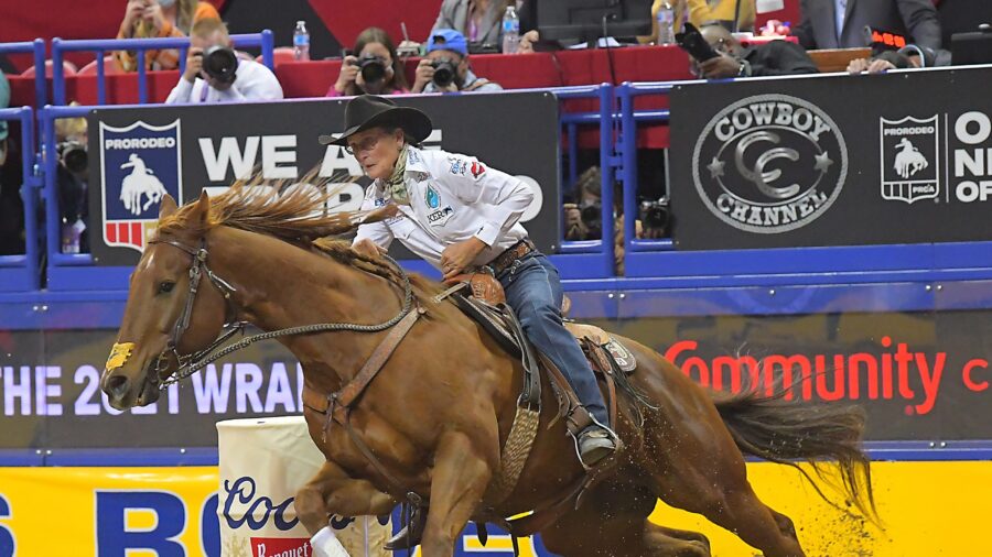 Dona Kay Rule leaving a barrel at the Wrangler NFR