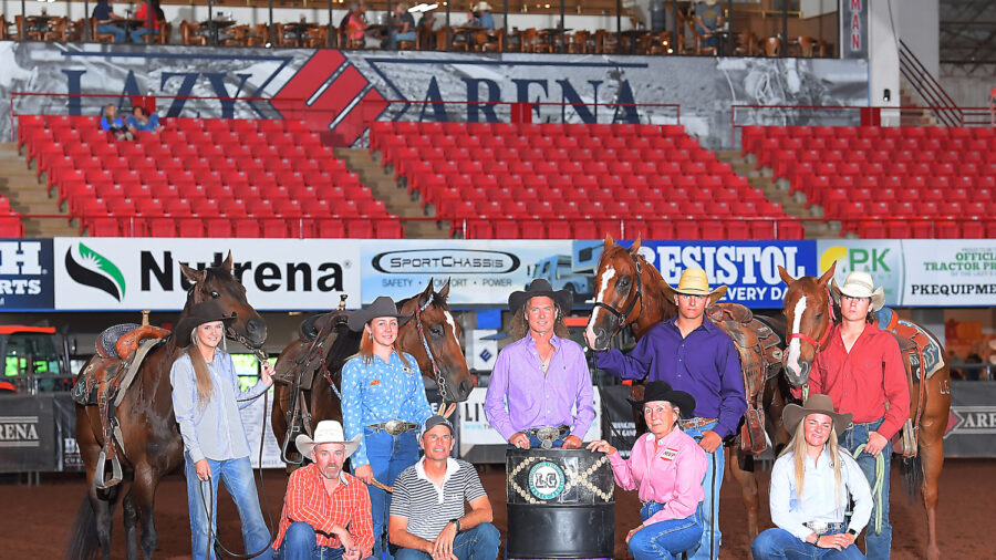 Members of the LG Legacy Project gather around a barrel