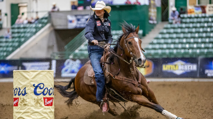 Paige Jones turns a barrel