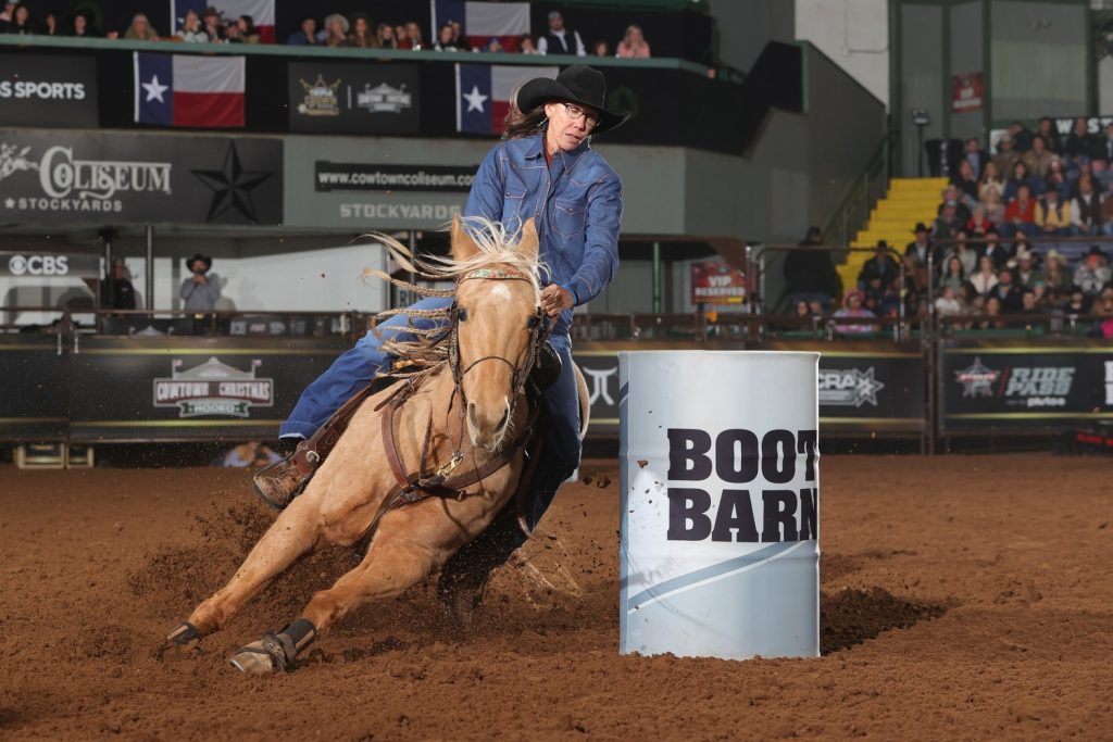 Andrea Cline turns second barrel at WCRA Cowtown Christmas Championship Rodeo