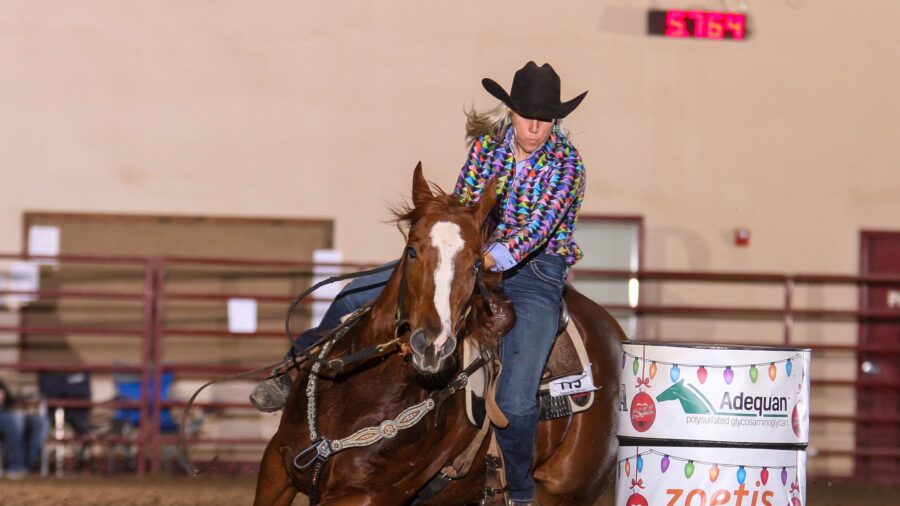 Bert Skimehorn turns barrel at Kissmas Juvenile Futurity and Open Barrel Race.