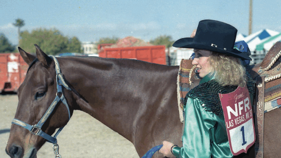 Charmayne James with her NFR back number on standing by Scamper