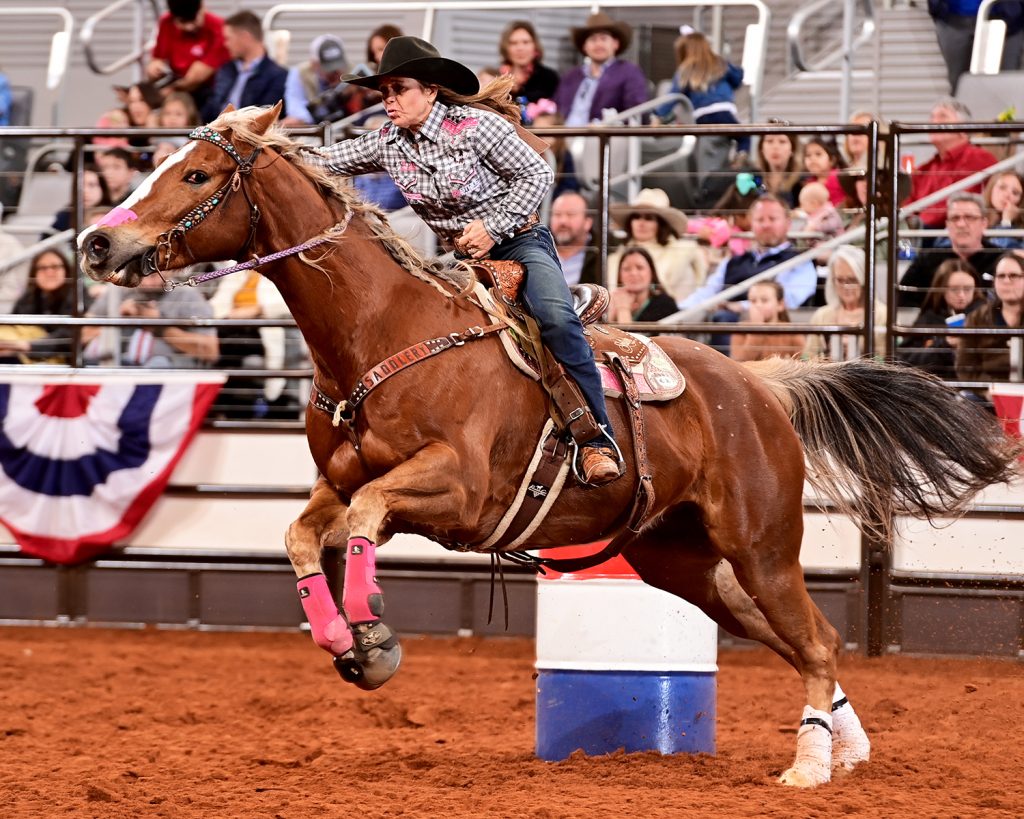 Shelley Morgan leaves the first barrel at Fort Worth