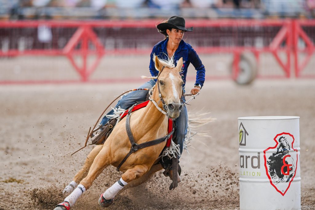 Jessica Routier turning second barrel at Cheyenne Frontier Days