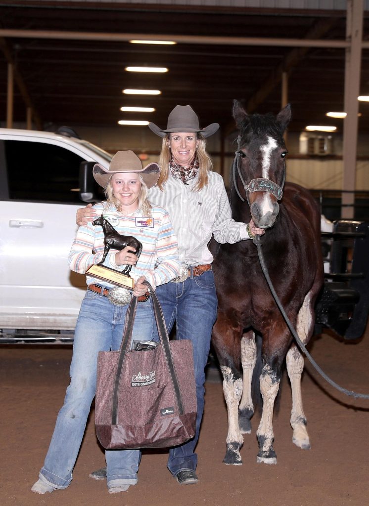 Lexie Miller with Sherry Cervi accepting Sherry Cervi Youth Championships Horse With the Most Heart award