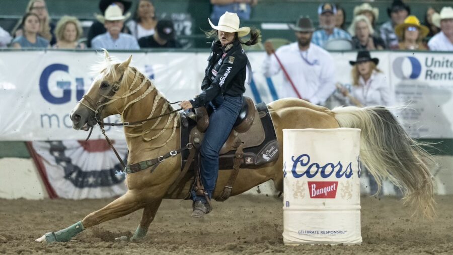 Hailey Kinsel turning barrel at Reno Rodeo