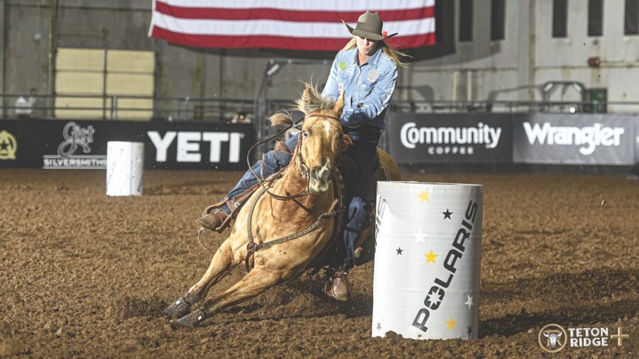 Sherry Cervi turning around a barrel on her horse. Photo courtesy of Teton Ridge