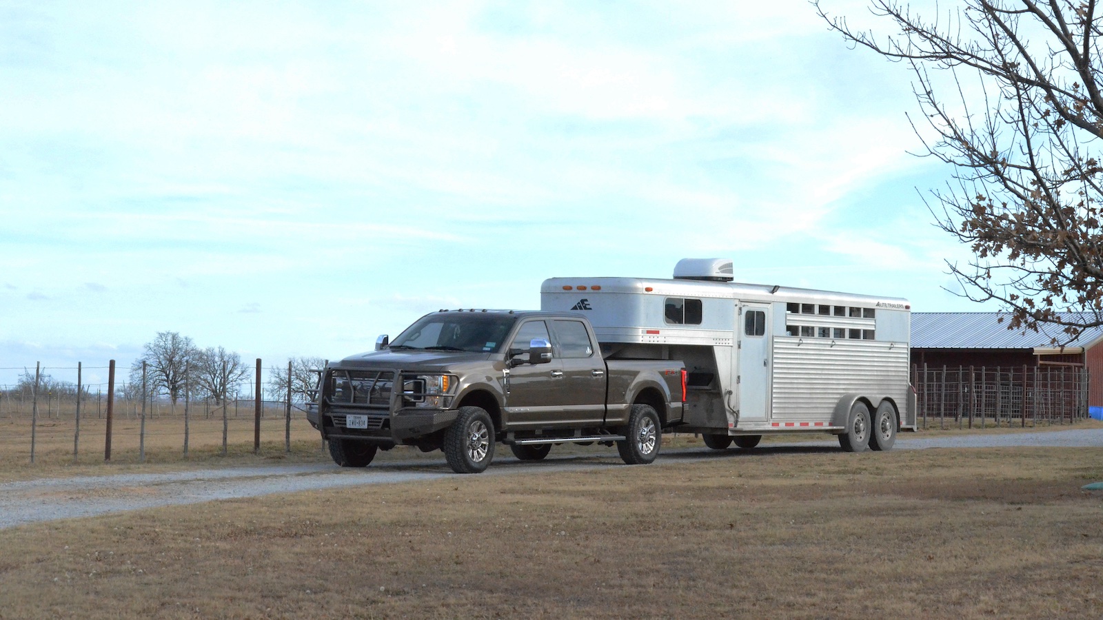 Grey ford truck hooked up to a livestock trailer. Photo by Kailey Sullins
