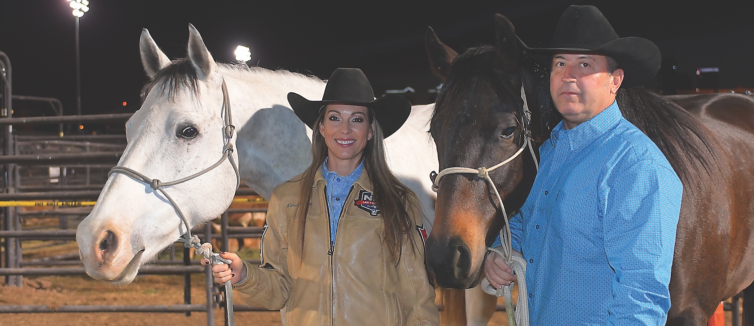 Kassie Mowry and Michael Boone with horses at the 2023 NFR. Photo by Kenneth Springer
