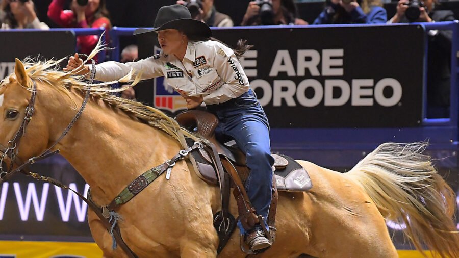 Hailey Kinsel barrel racing at NFR