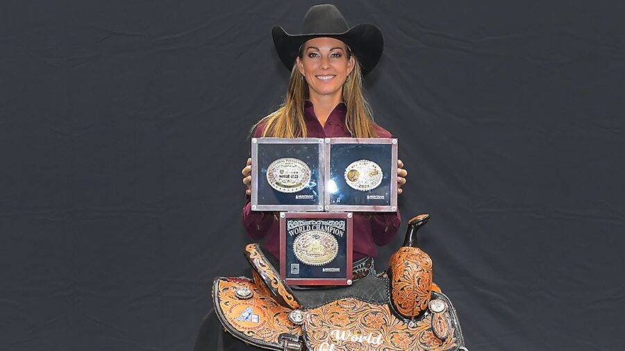 Kassie Mowry with her world championship buckle