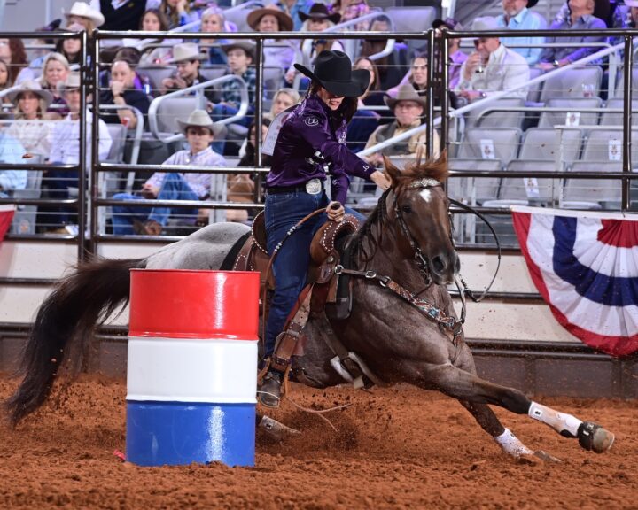 Andrea Busby and Born On Derby Day turning the first barrel
