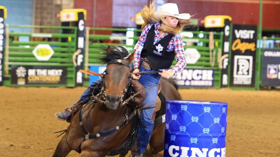 college rodeo barrel racer turning second barrel