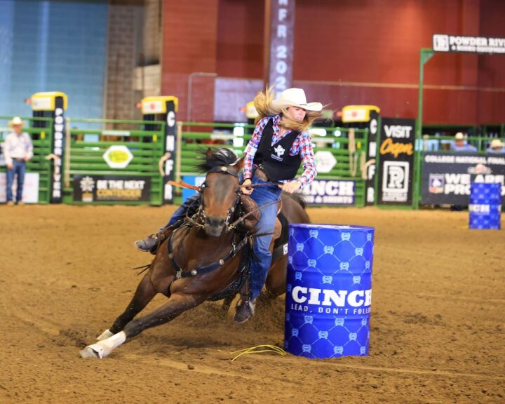 college rodeo barrel racing turning barrel