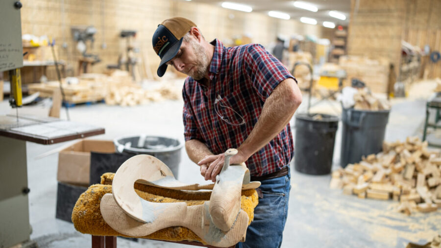 Brodie Powell working on a saddle tree