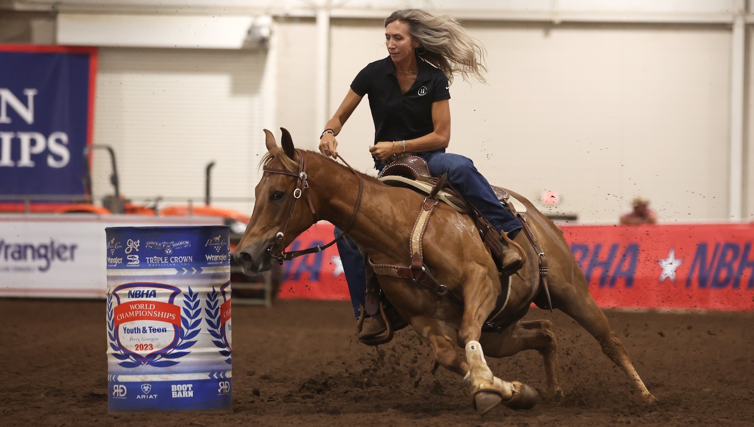 Charmayne James turning a barrel at one of her clinics