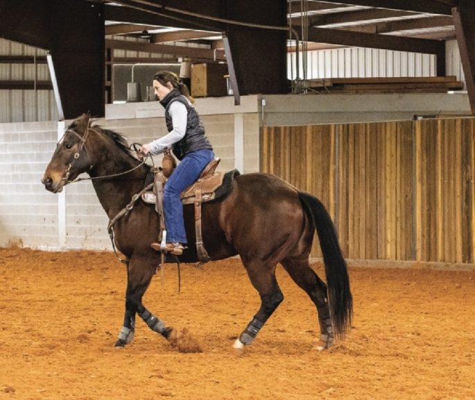 Make a 90-degree turn to the left, then pick up a lope or a trot and head for the second barrel. 