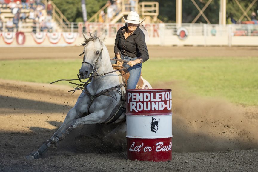 Horse turning barrel at Pendleton Round-Up