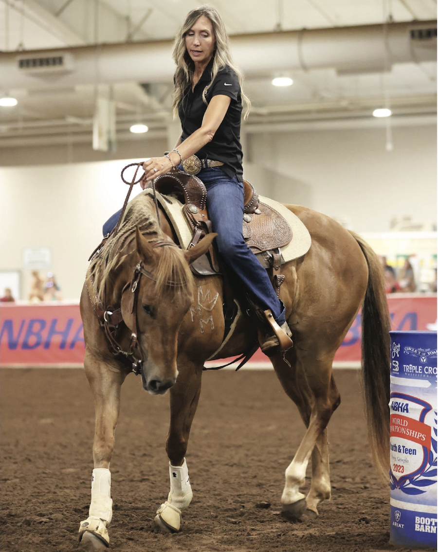 Charmayen James on a horse at once of her clinis